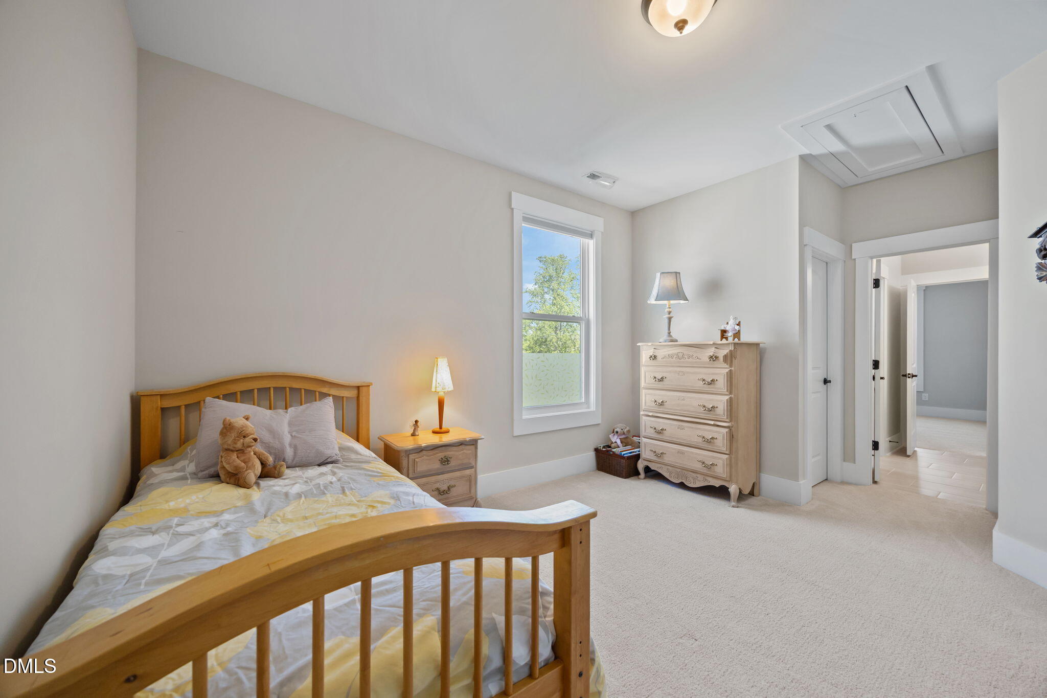 1324 Spicer Lane Rolesville, NC 27571 - Photo 35 of 59 a bedroom with a bed and furniture