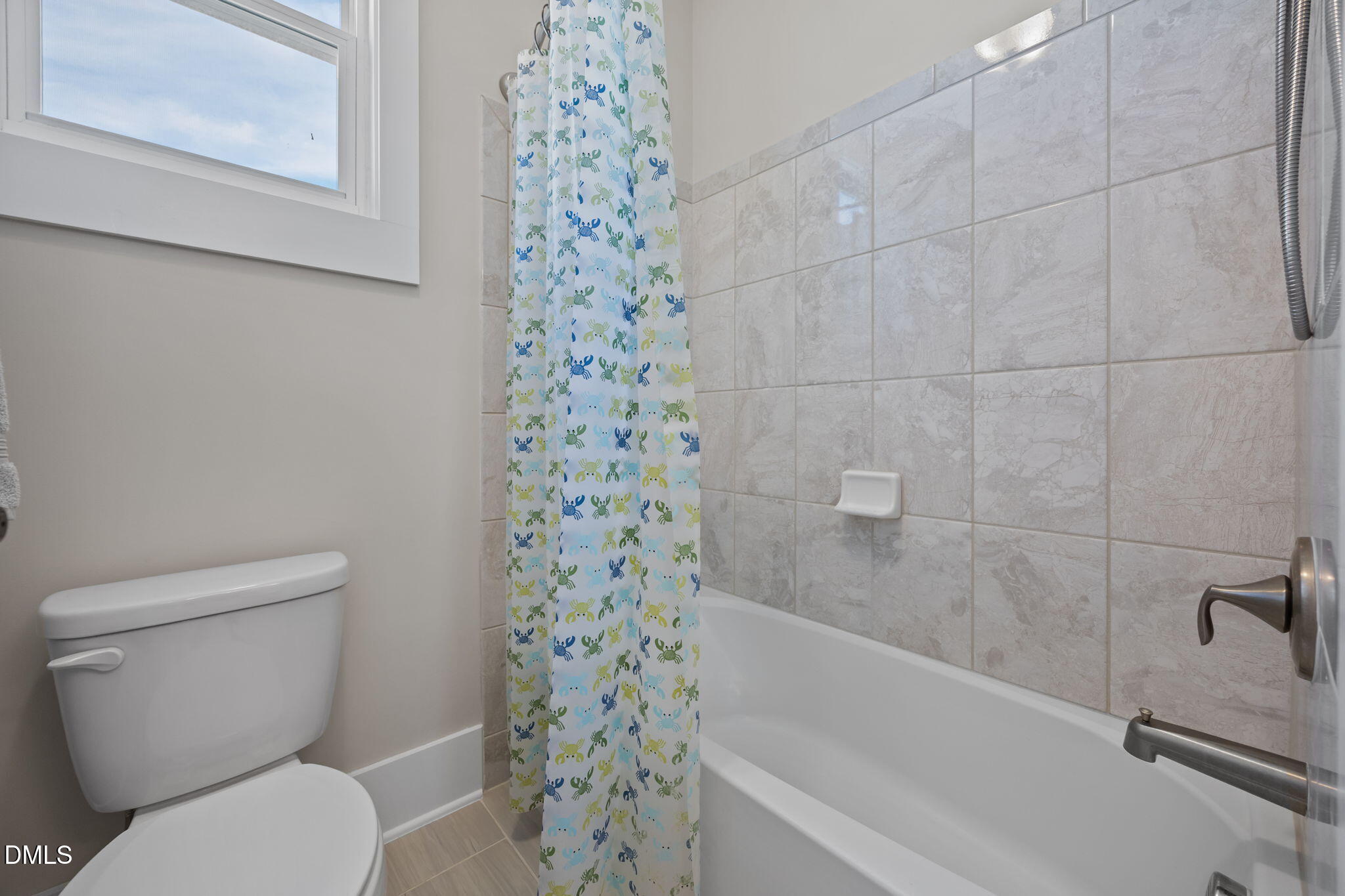 1324 Spicer Lane Rolesville, NC 27571 - Photo 37 of 59 a white toilet sitting next to a bath tub