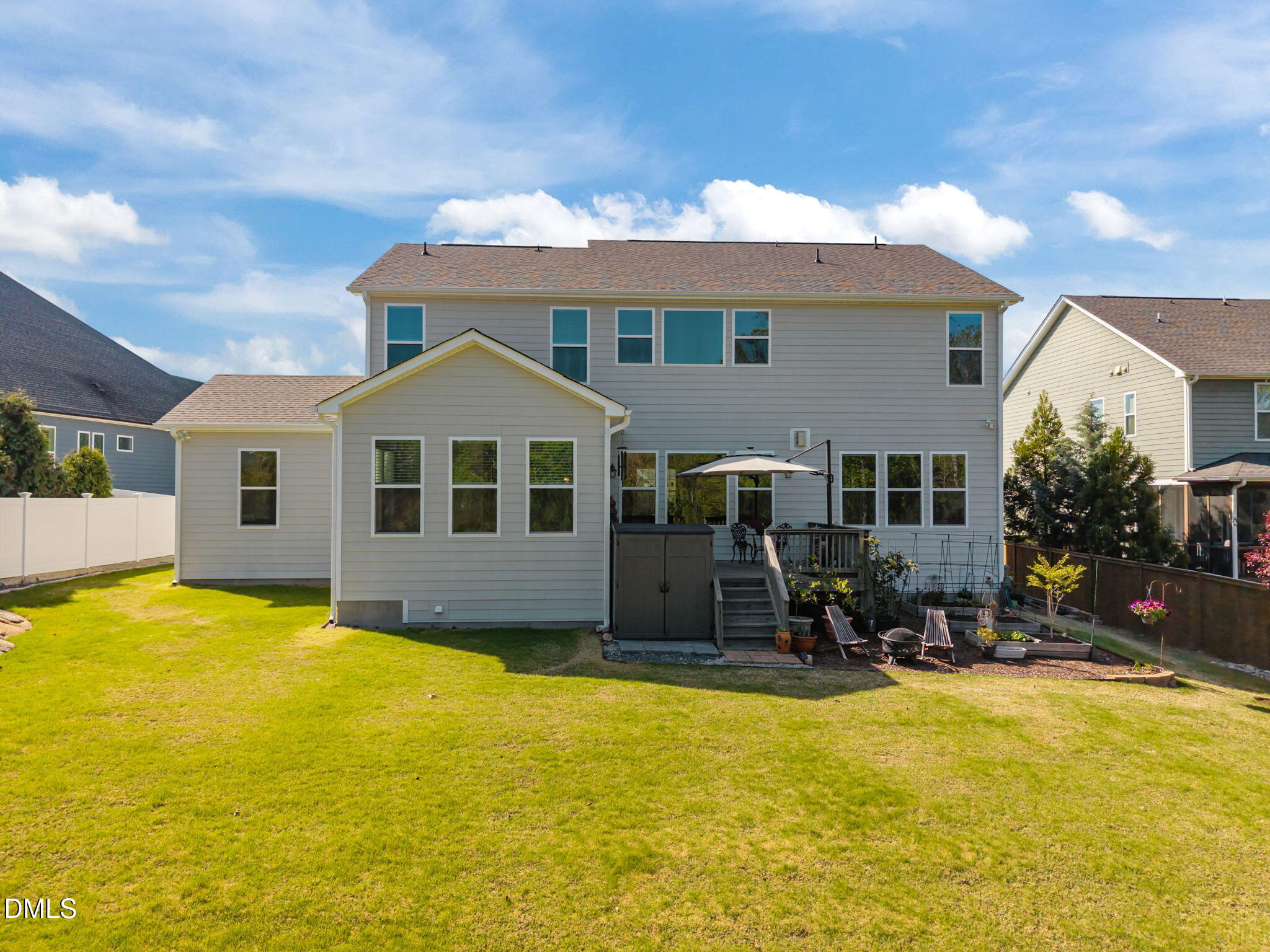 1324 Spicer Lane Rolesville, NC 27571 - Photo 44 of 59 a front view of house with yard and seating area