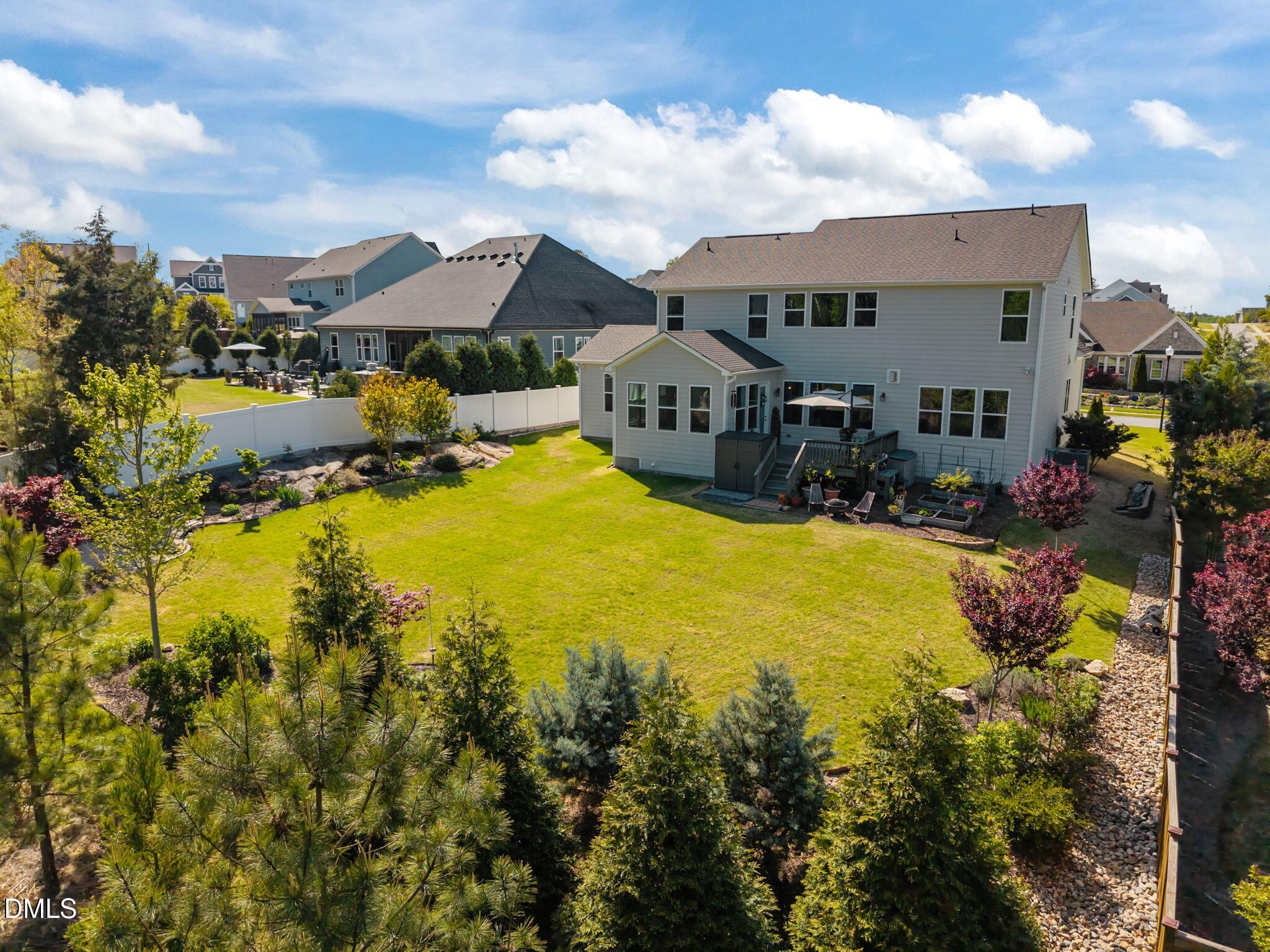 1324 Spicer Lane Rolesville, NC 27571 - Photo 45 of 59 a view of a house with swimming pool and mountains in the background
