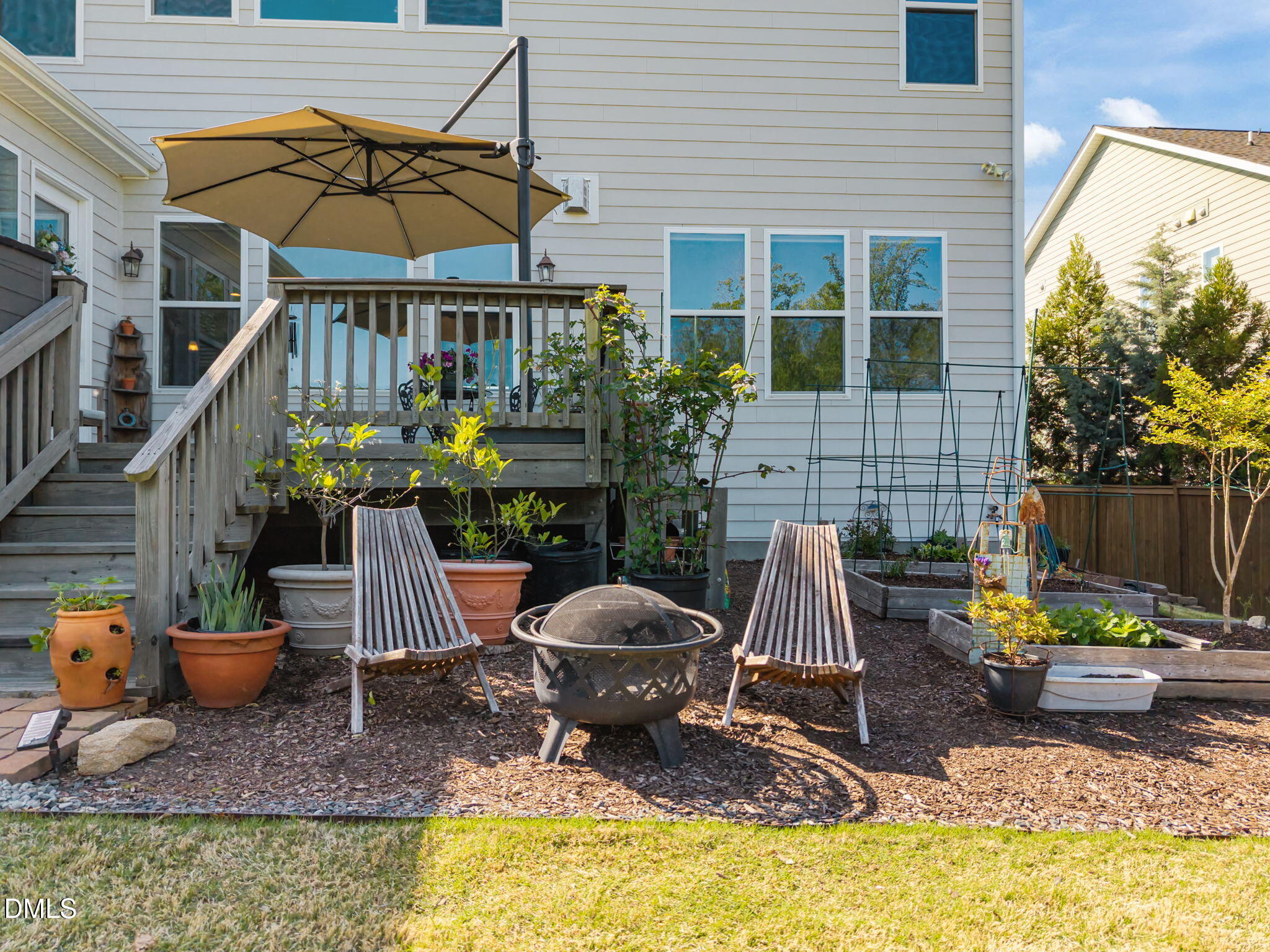 1324 Spicer Lane Rolesville, NC 27571 - Photo 49 of 59 a view of a chair and tables in the patio