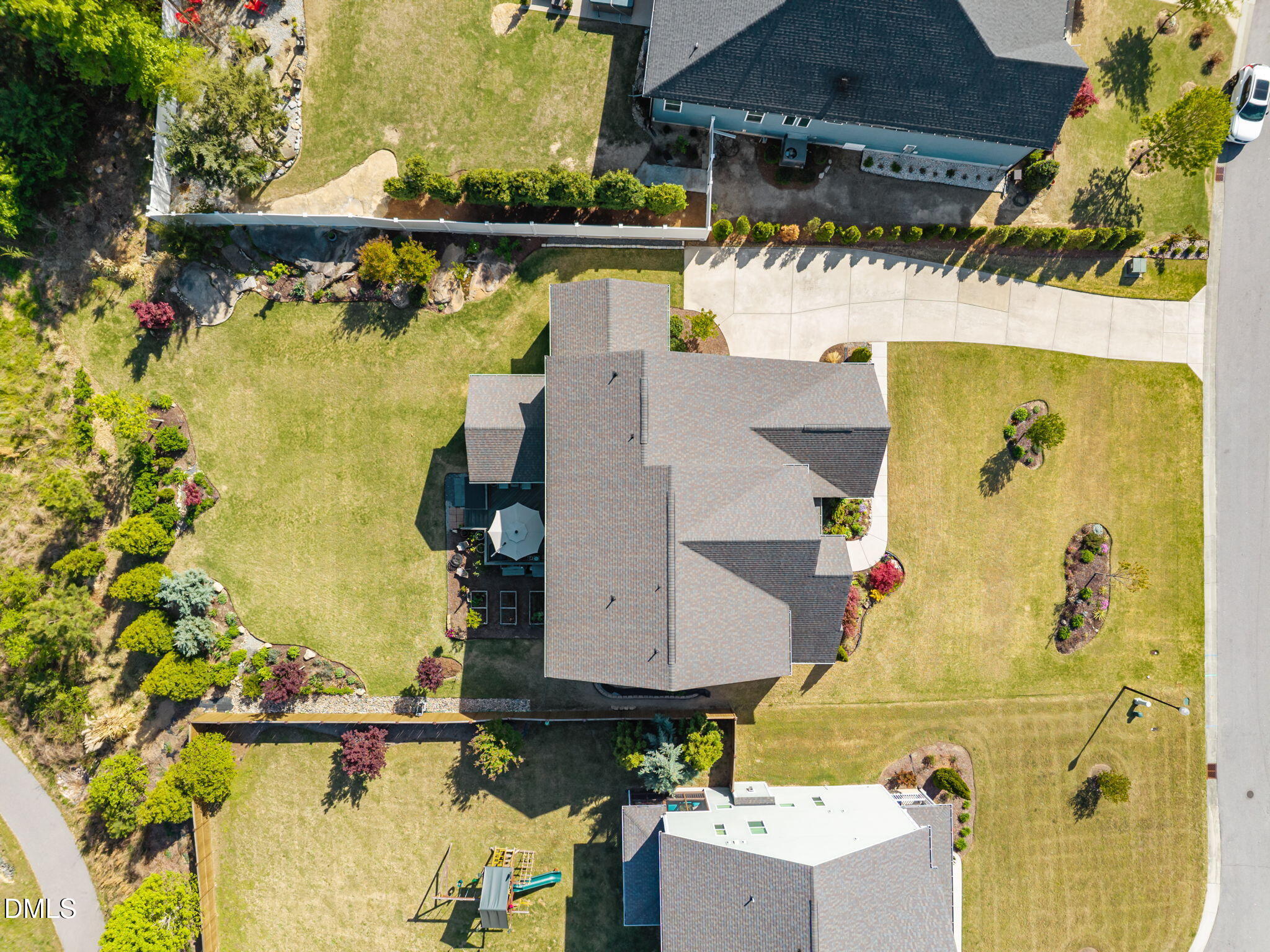 1324 Spicer Lane Rolesville, NC 27571 - Photo 50 of 59 an aerial view of residential house with outdoor space and swimming pool