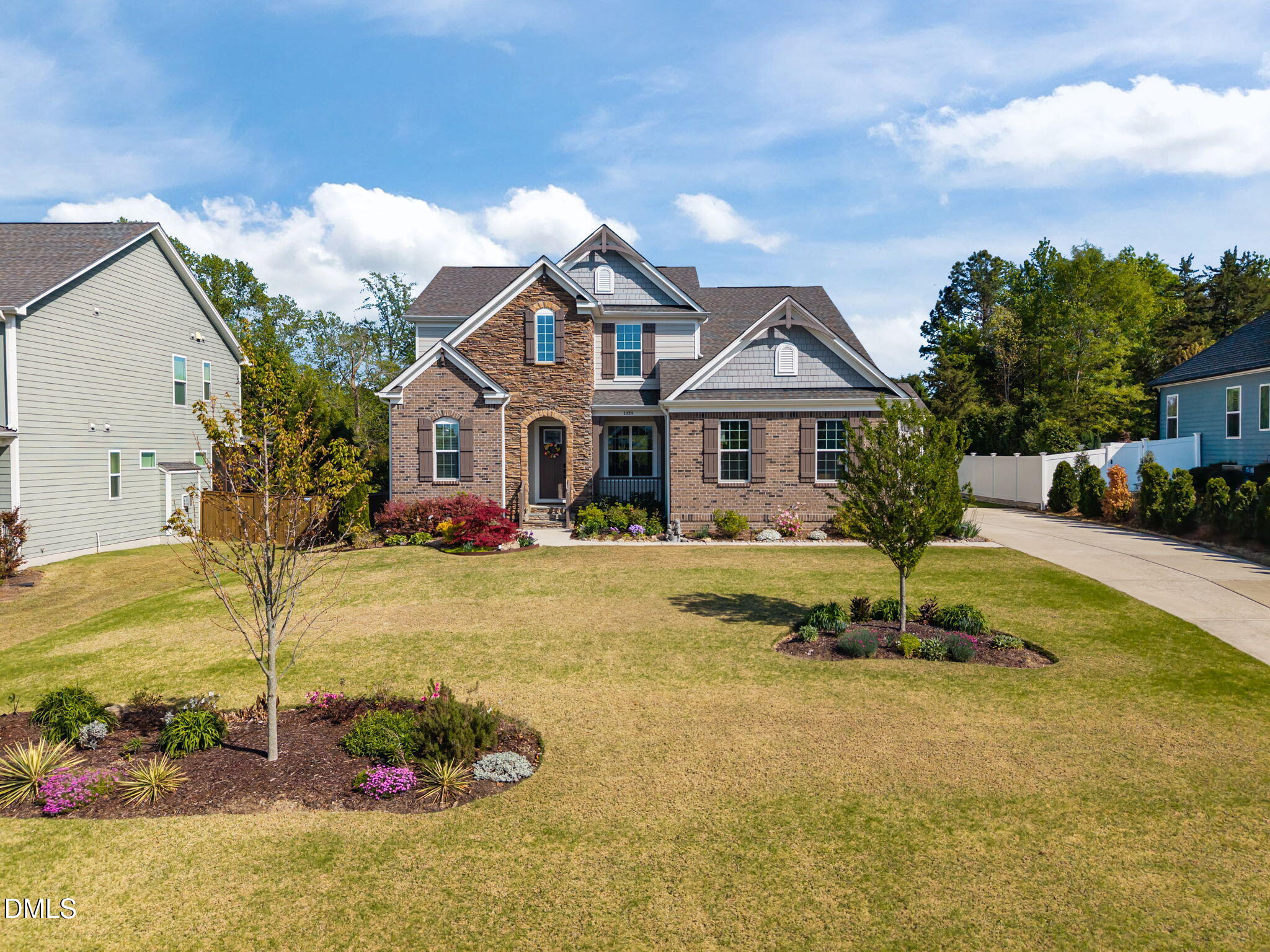 1324 Spicer Lane Rolesville, NC 27571 - Photo 55 of 59 a front view of a house with swimming pool yard and outdoor seating
