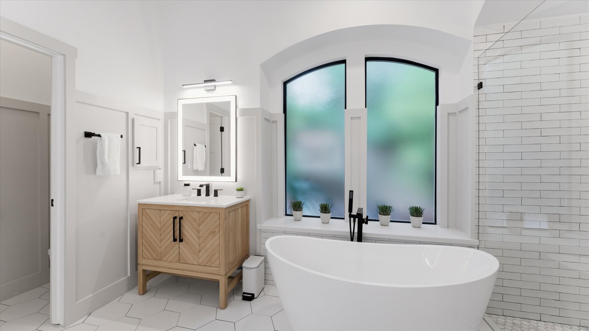 2 South Winsome Path Circle Spring, TX 77382 - Photo 26 of 47 a bathroom with a bathtub and a sink