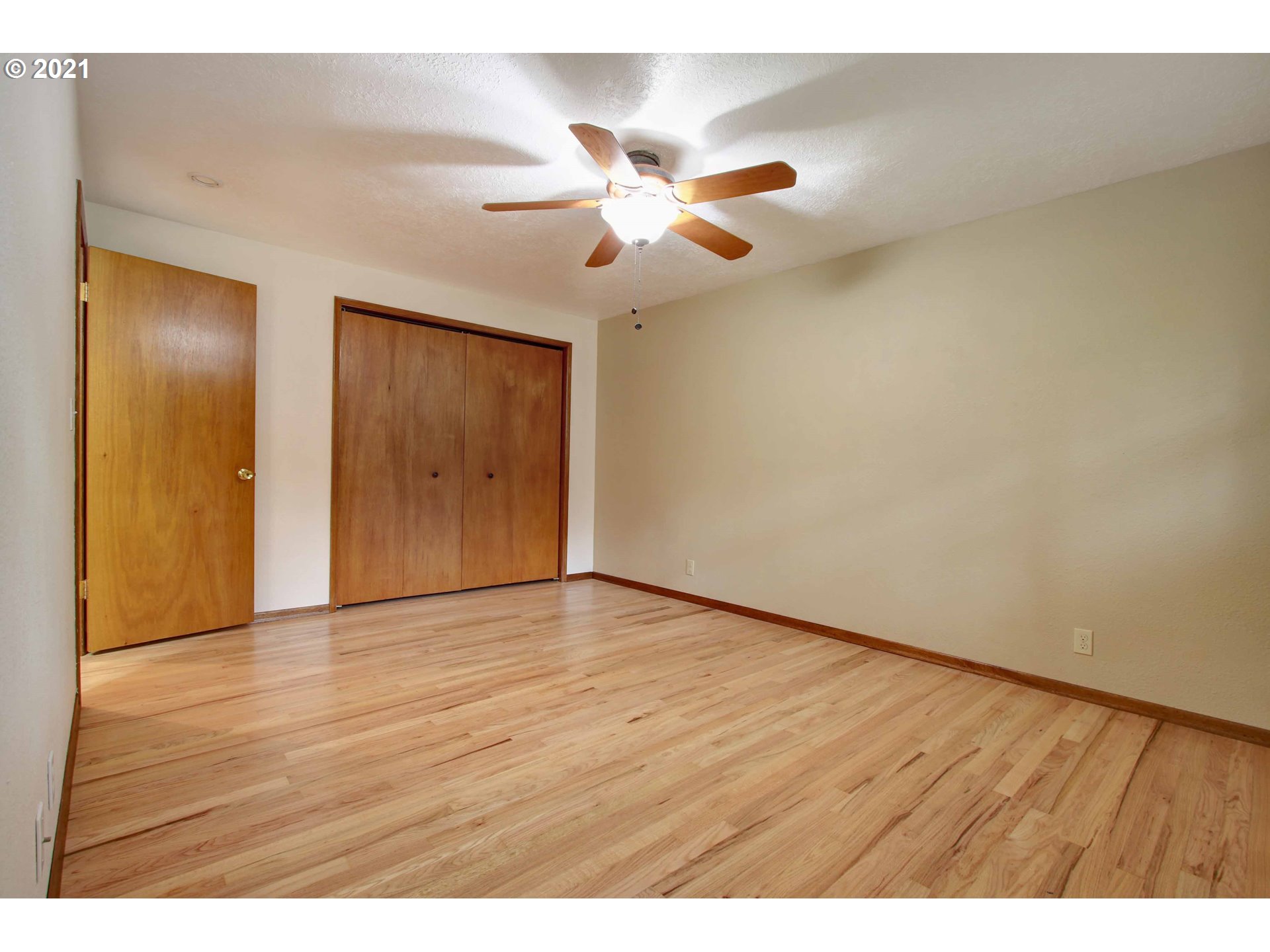 12740 Southwest Foothill Drive Portland, OR 97225 - Photo 16 of 27 a view of an empty room and wooden floor