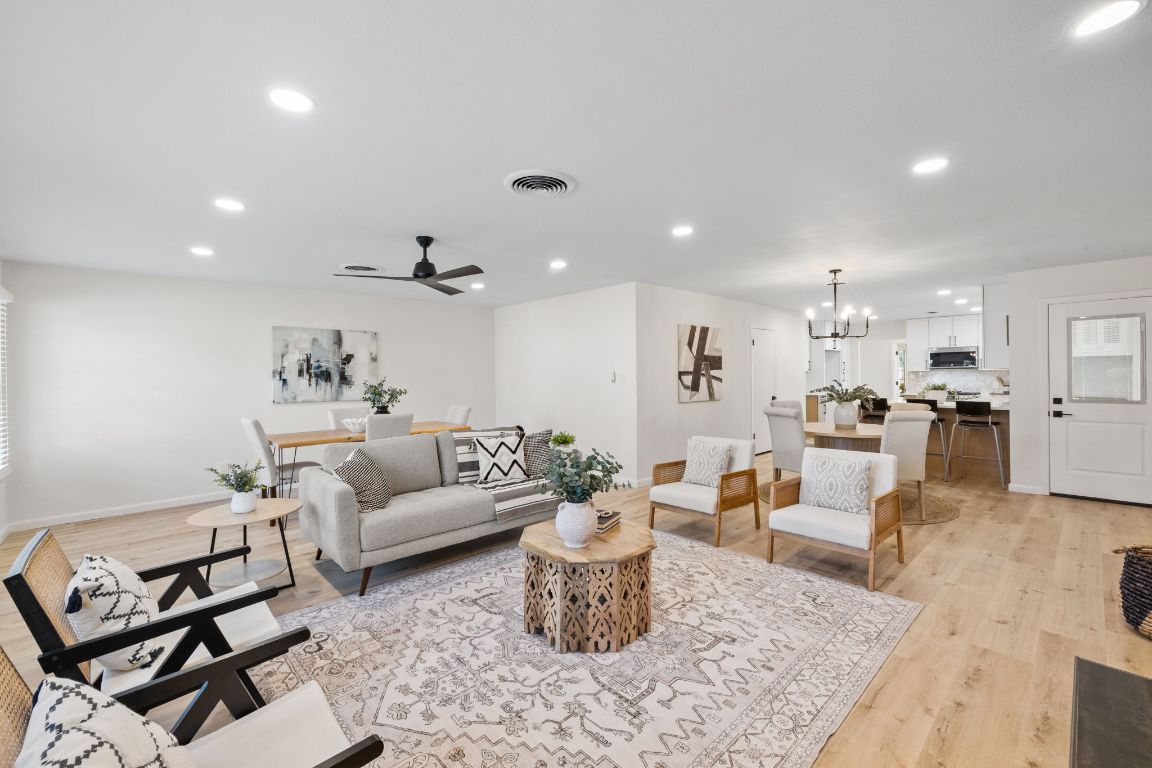 3012 Hunt Trail Austin, TX 78757 - Photo 13 of 29 a living room with furniture and kitchen view
