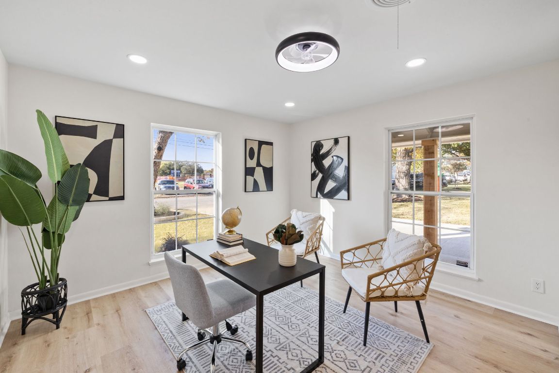 3012 Hunt Trail Austin, TX 78757 - Photo 6 of 29 a view of a dining room with furniture window and wooden floor