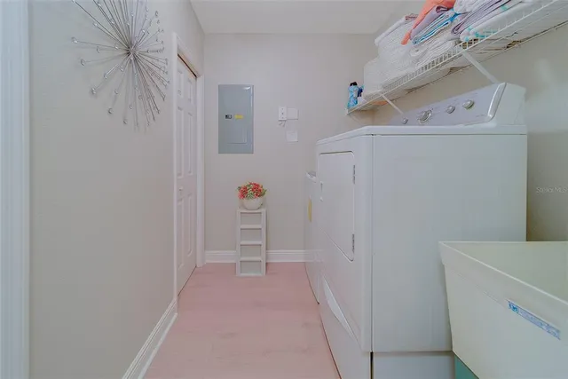 a view of two chairs in the patio