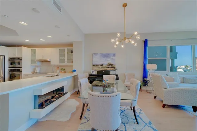 a balcony with furniture and city view