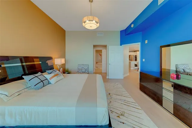 a bathroom with a double vanity sink toilet and shower