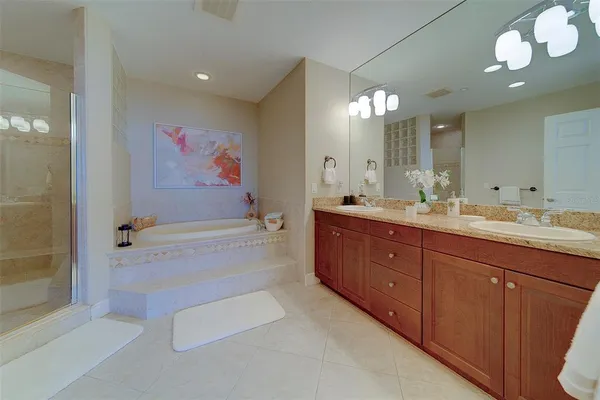 a bedroom with a bed and a table