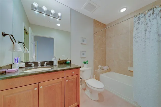 an aerial view of a house with swimming pool