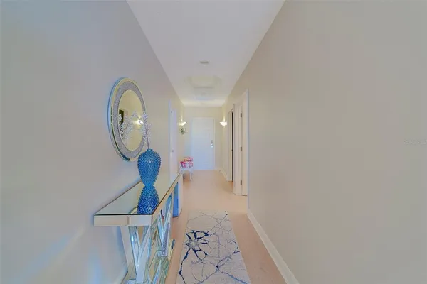 a kitchen with cabinets and stainless steel appliances