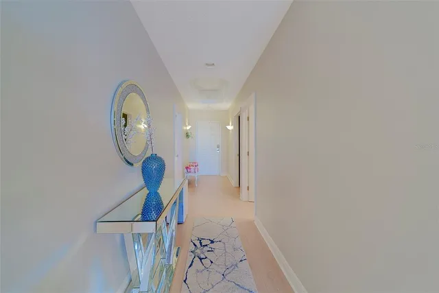 a kitchen with cabinets and stainless steel appliances