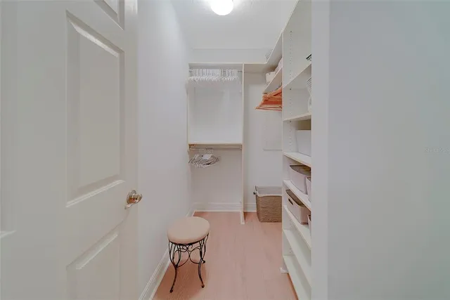 a view of a swimming pool with a lounge chair