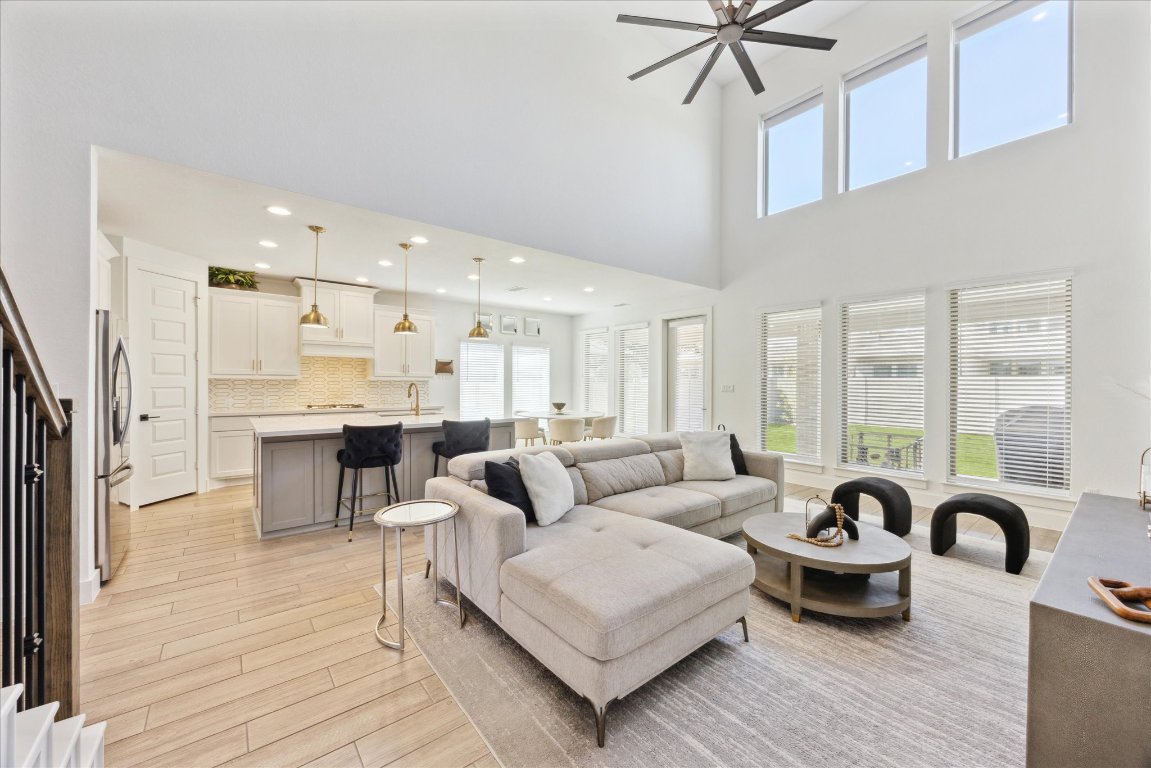 1005 Highcrest Georgetown, TX 78628 - Photo 1 of 1 a living room with furniture a table and wooden floor