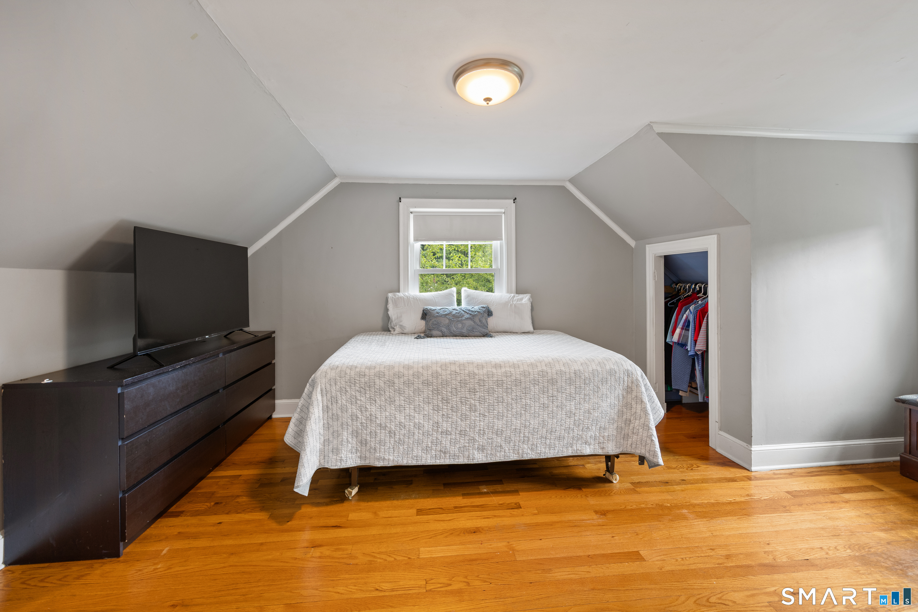 301 Wiese Road Cheshire, CT 06410 - Photo 24 of 40 Bedroom 4 on the upper level is home to built in shelving and desk