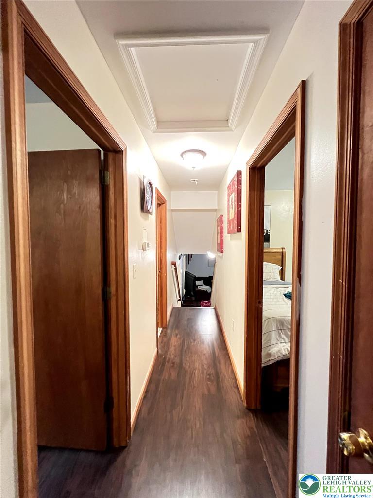 107 Warbler Court Bushkill, PA 18324 - Photo 21 of 32 a view of a hallway with wooden floor and staircase