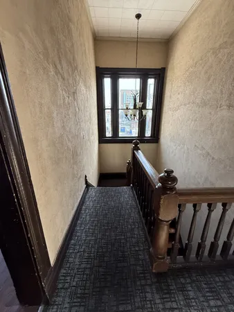 a hallway with windows