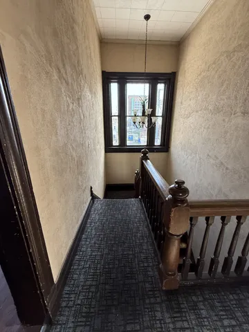 a hallway with windows