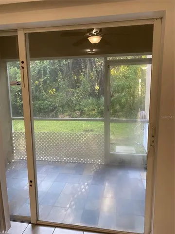 a view of a room with a large window