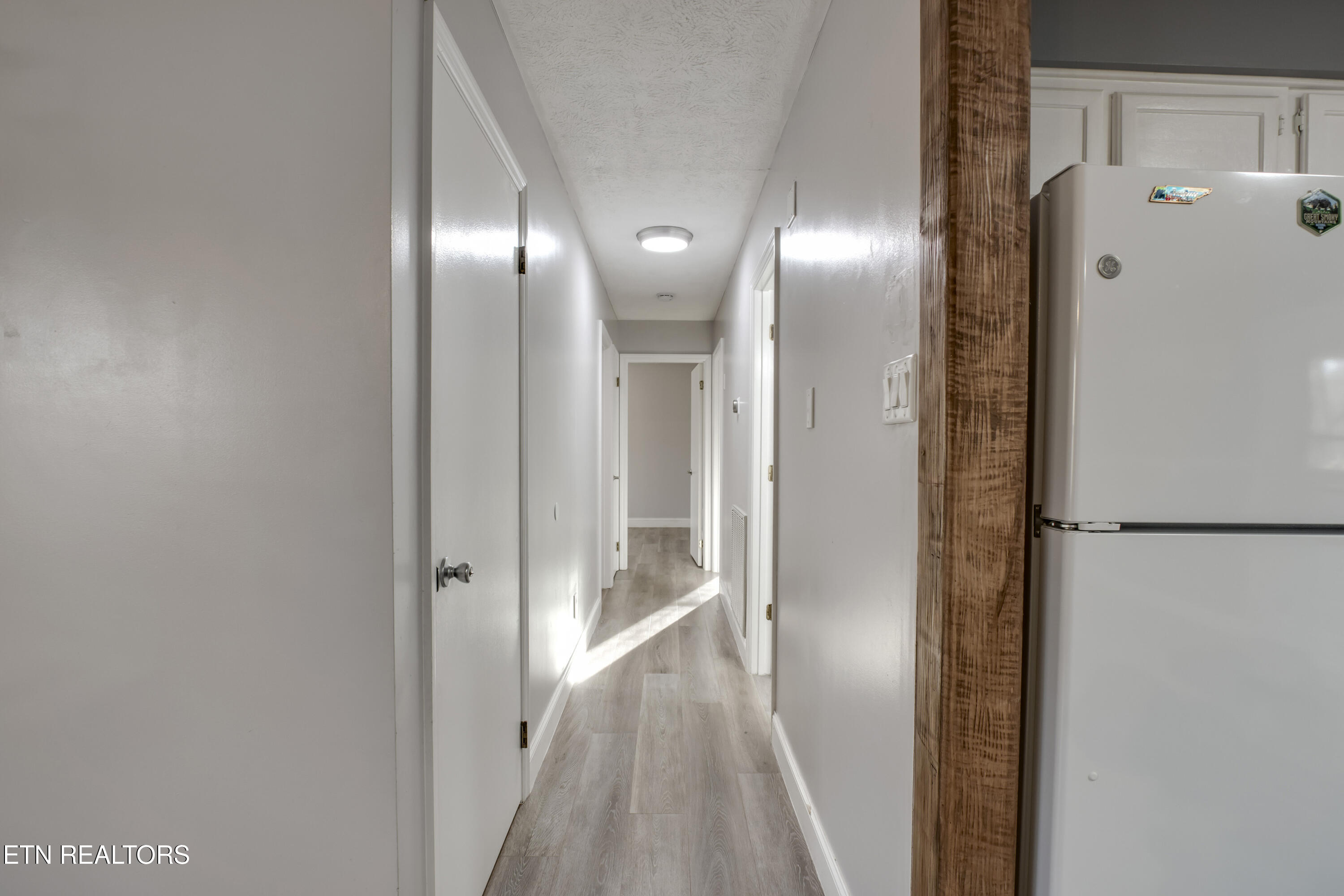 521 Sourdough Hollow Road Kodak, TN 37764 - Photo 16 of 50 16_SourdoughHollowRoad_521_BedroomHall01