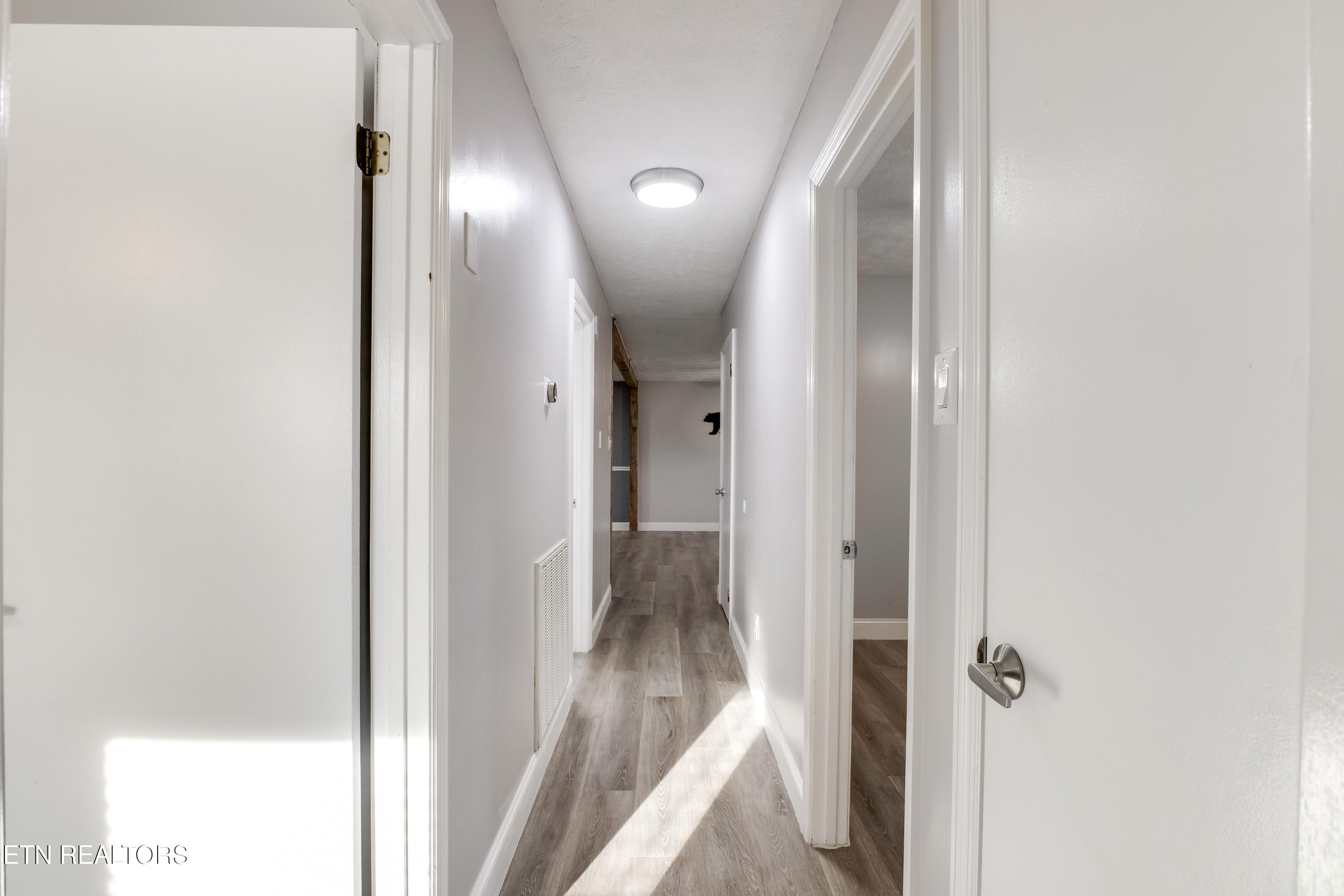 521 Sourdough Hollow Road Kodak, TN 37764 - Photo 25 of 50 25_SourdoughHollowRoad_521_BedroomHall02