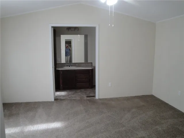 a view of cabinet and mirror