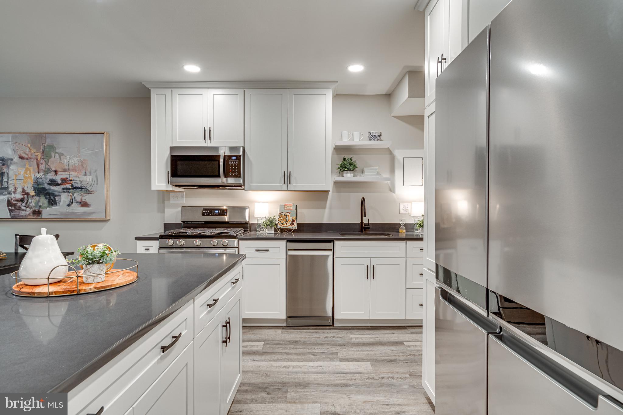 1200 South Arlington Ridge Road, Unit 208 Arlington, VA 22202 - Photo 10 of 26 Gorgeous 42" Cabinetry with Stunning Granite