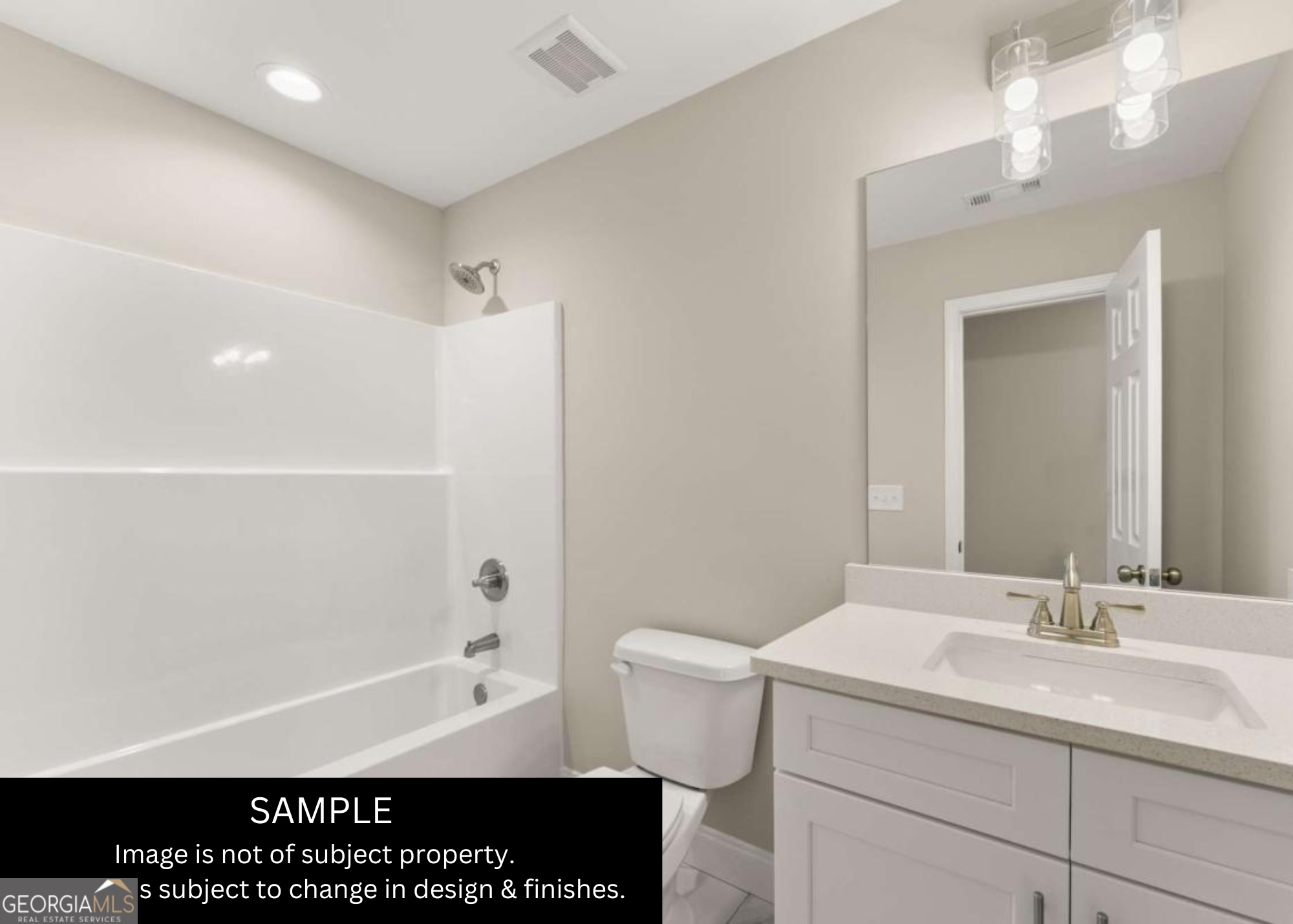 432 Nancy Town Road Mount Airy, GA 30563 - Photo 12 of 15 a bathroom with a sink a toilet and shower