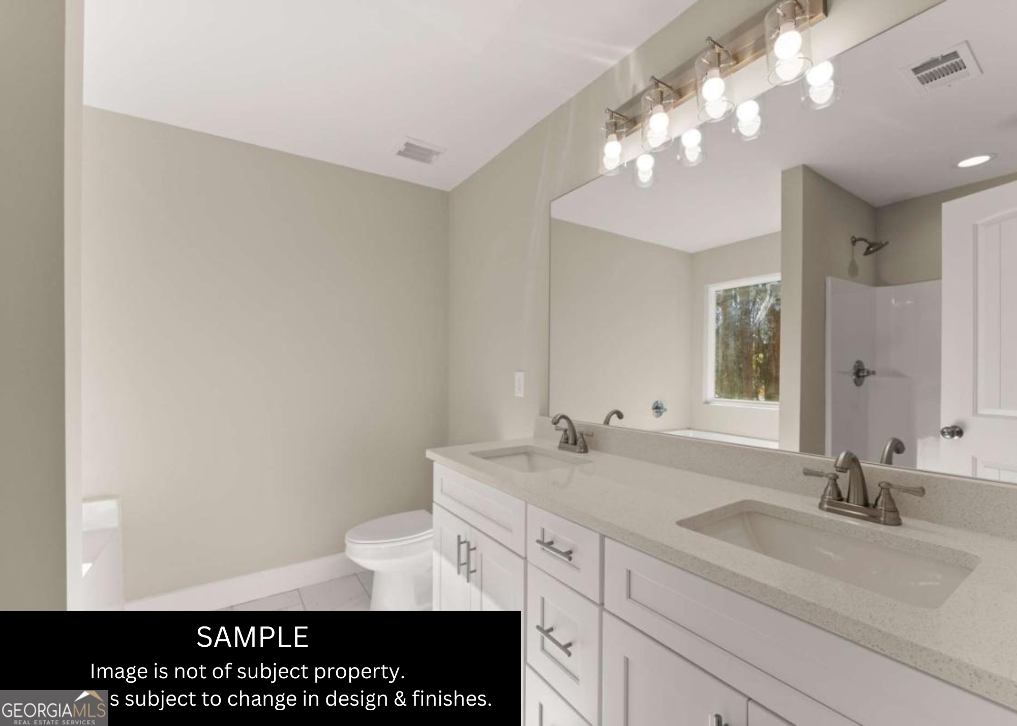 432 Nancy Town Road Mount Airy, GA 30563 - Photo 8 of 15 a bathroom with a sink and a mirror