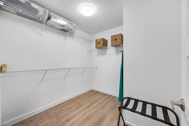 a view of a room with racks on the wall