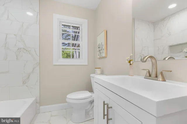a bathroom with a shower and a bathtub
