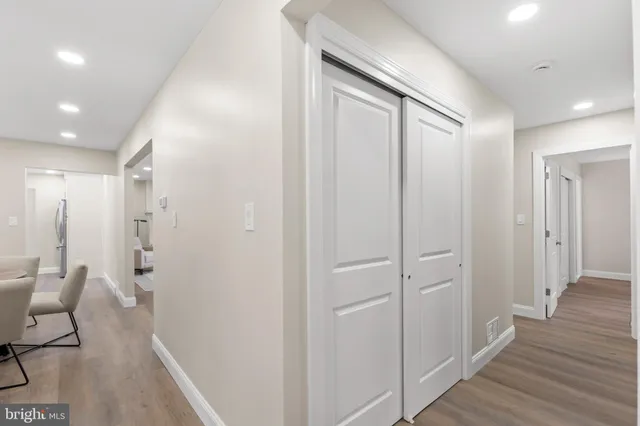 a bedroom with bed and a window