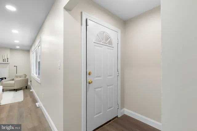 a very nice looking room with wooden floor