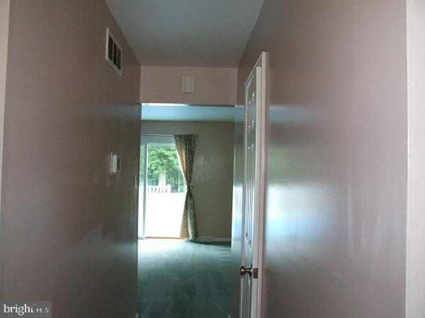 3236 Roxbury Road Hatfield, PA 19440 - Photo 9 of 38 Inviting hallway to serene outdoor views.