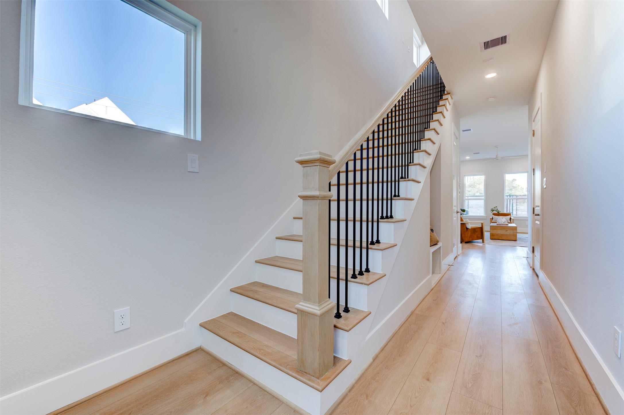 5142 Rosslyn Road Houston, TX 77018 - Photo 16 of 40 a view of entryway and hall with wooden floor