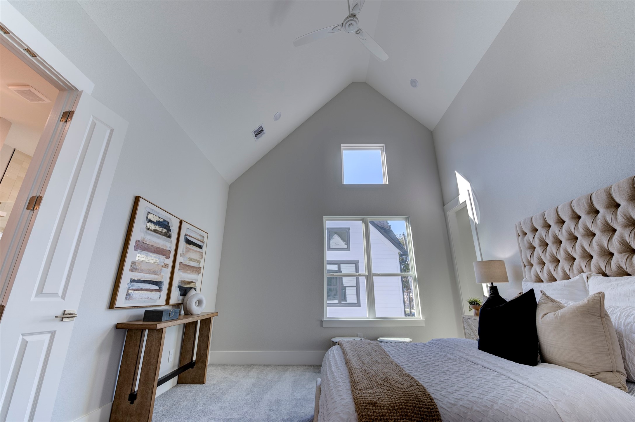 5142 Rosslyn Road Houston, TX 77018 - Photo 23 of 40 a bedroom with a bed and wooden floor