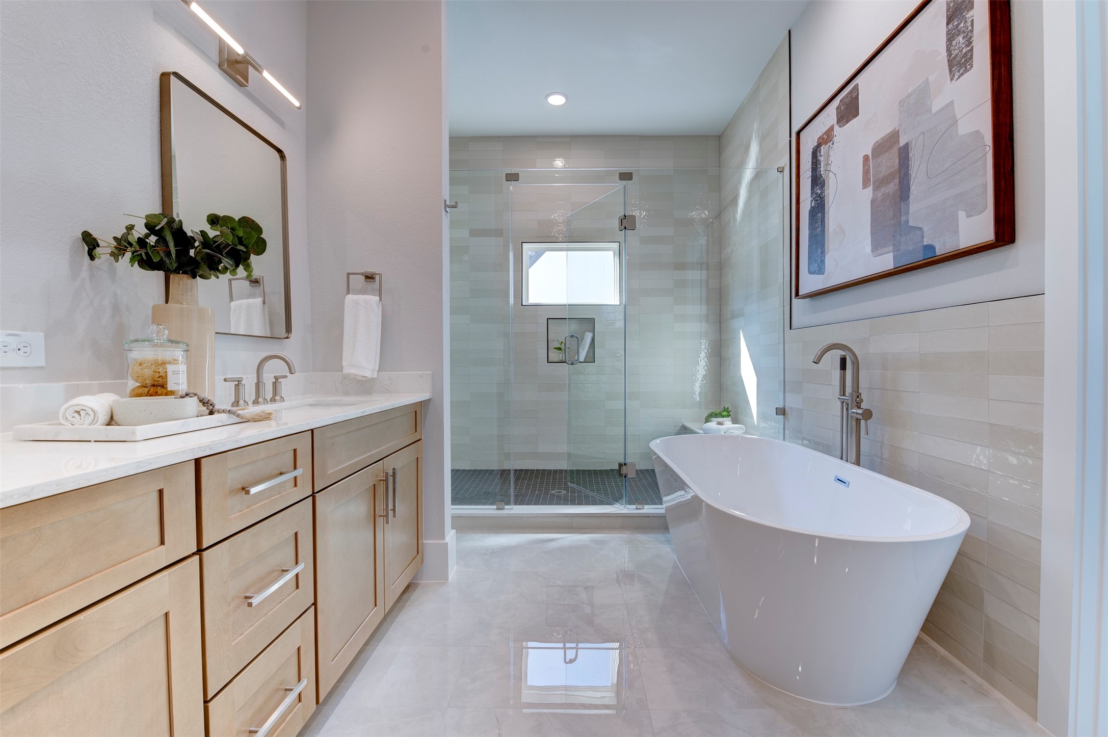 5142 Rosslyn Road Houston, TX 77018 - Photo 26 of 40 a bathroom with a white tub sink and mirror