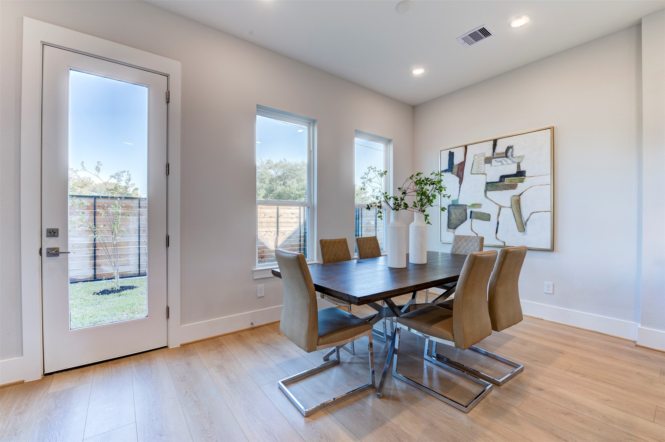 5142 Rosslyn Road Houston, TX 77018 - Photo 8 of 40 a view of a dining room with furniture window and wooden floor