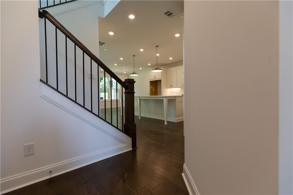 4912 Molder Avenue, Unit 66 Buford, GA 30518 - Photo 8 of 83 a view of entryway with wooden floor