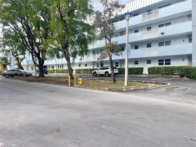 a view of a street with houses