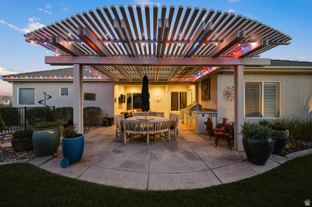 2829 East 1880th Street South St. George, UT 84790 - Photo 46 of 54 View of patio featuring a pergola and an outdoor kitchen / dining area