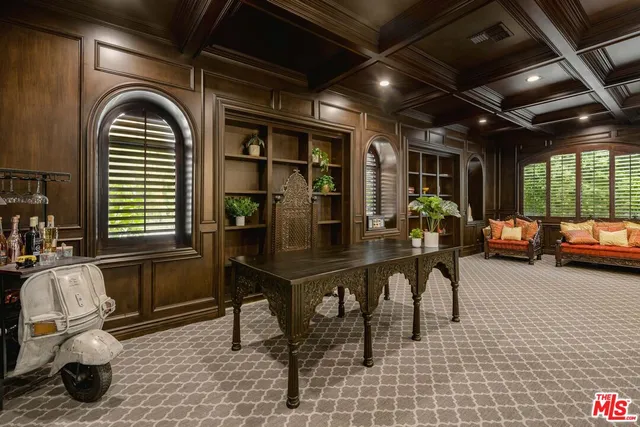 a view of a livingroom with furniture and window