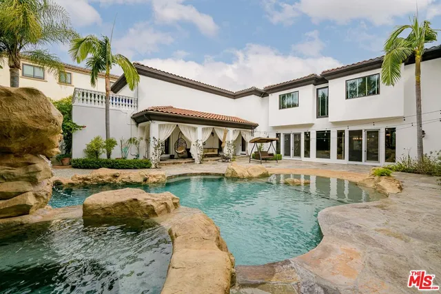 a car parked in front of a house
