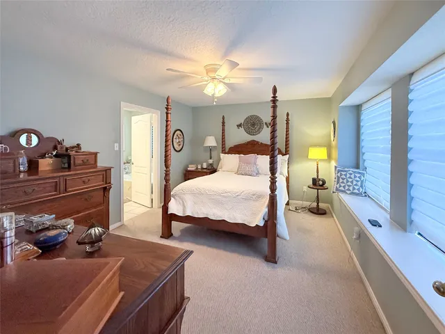 a bedroom with a bed and furniture