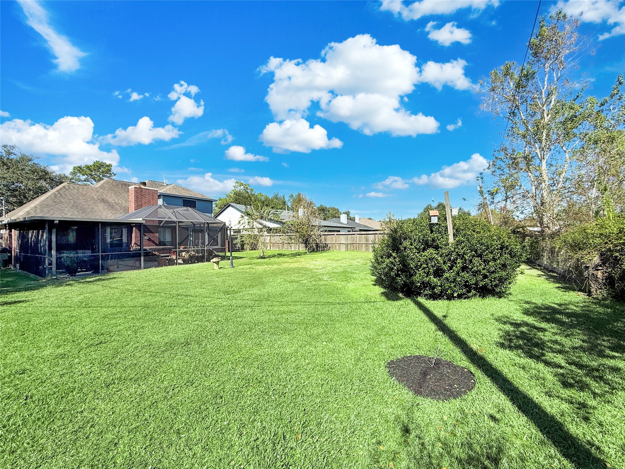 8 Rayburn Ridge Angleton, TX 77515 - Photo 5 of 22 a view of a house with a backyard