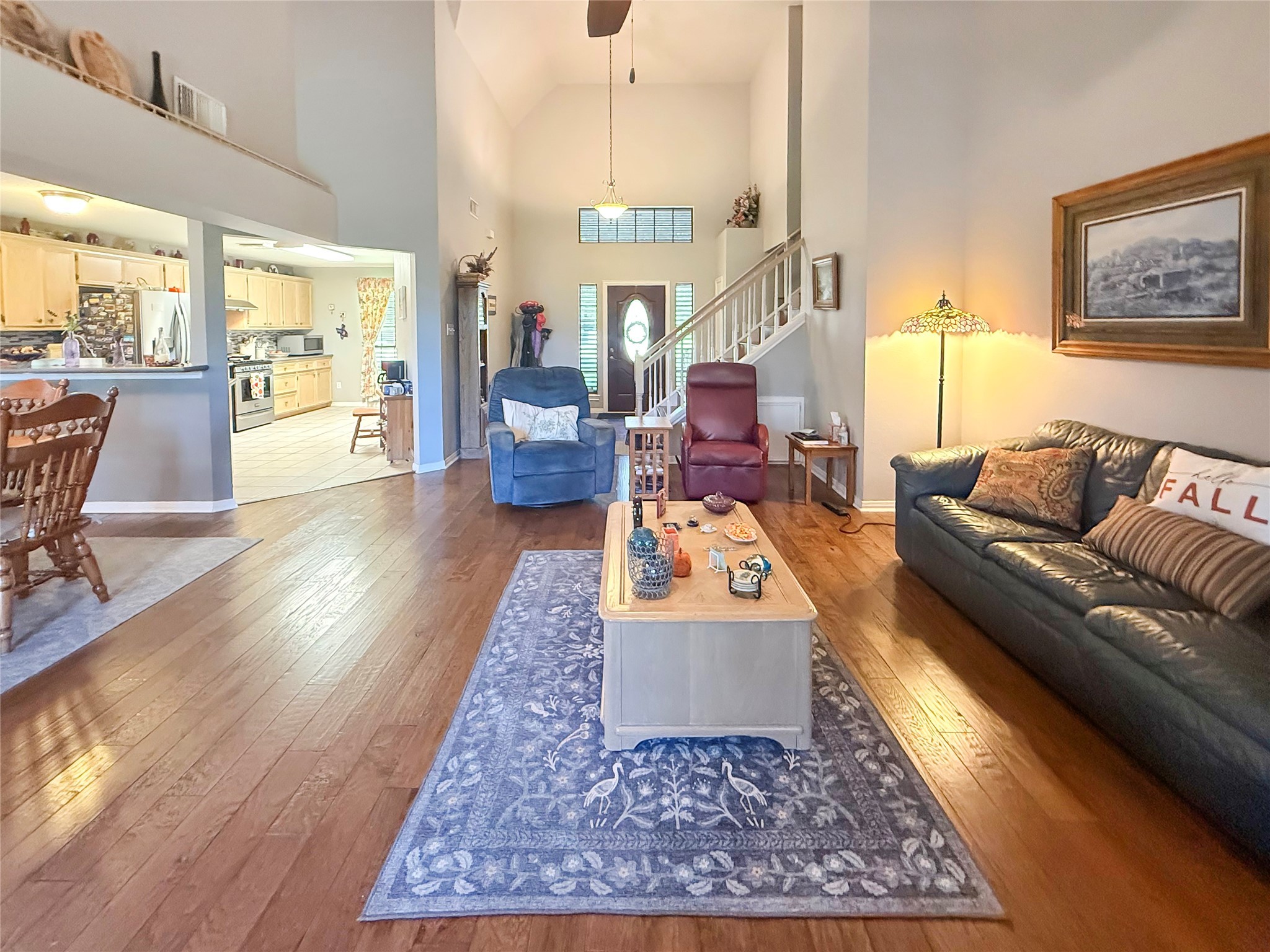 8 Rayburn Ridge Angleton, TX 77515 - Photo 6 of 22 a living room with furniture and a rug