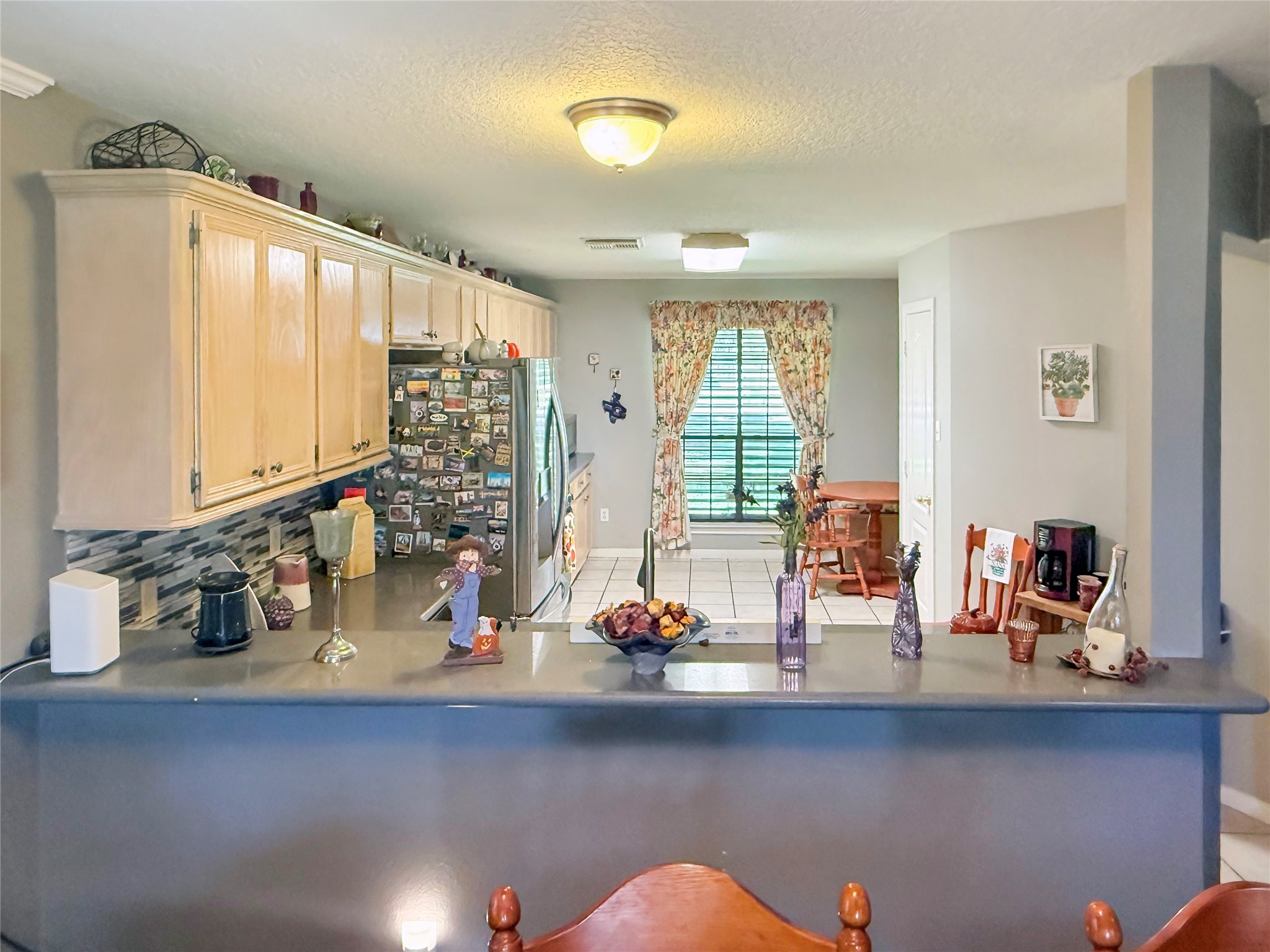 8 Rayburn Ridge Angleton, TX 77515 - Photo 10 of 22 a view of a room with two large windows