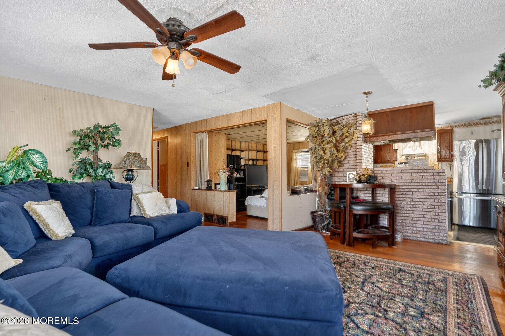 9 Hurley Street Keyport, NJ 07735 - Photo 15 of 22 a living room with furniture and wooden floor